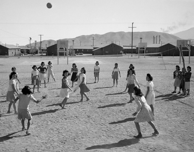 Kids playing at Mazanar, the biggest Japanese internment camp [photo by Ansel Adams via Wikimedia Commons]